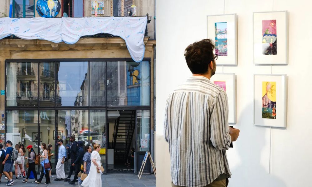 This is an image of a big artsy building with big glass front windows. To the right is also a man looking at artwork up on a wall.