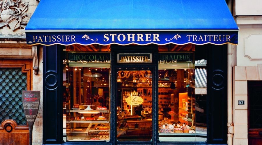 Blue store front of Paris chocolate shop Stohrer