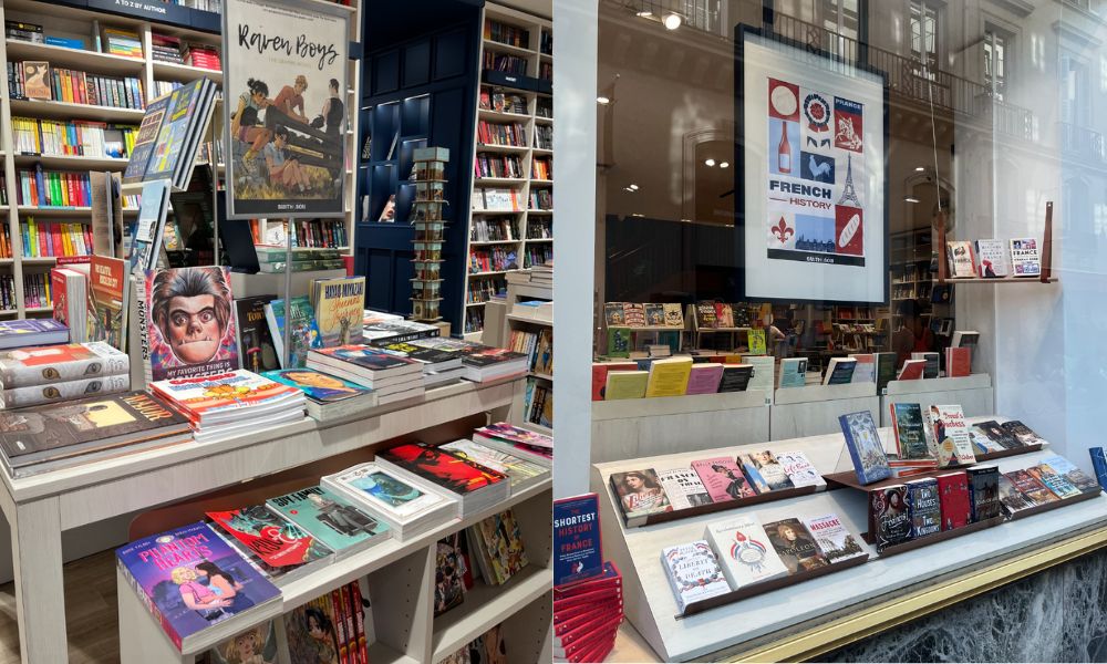 This is an image of a more modern bookstore with big glass windows showing a massive display of new books. Inside, you'll also see there is plenty of tables displaying new releases and more.