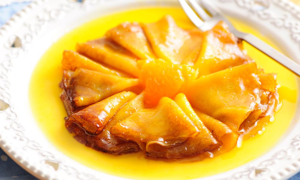 This is an image of a delicious, saucy crepe Suzette.