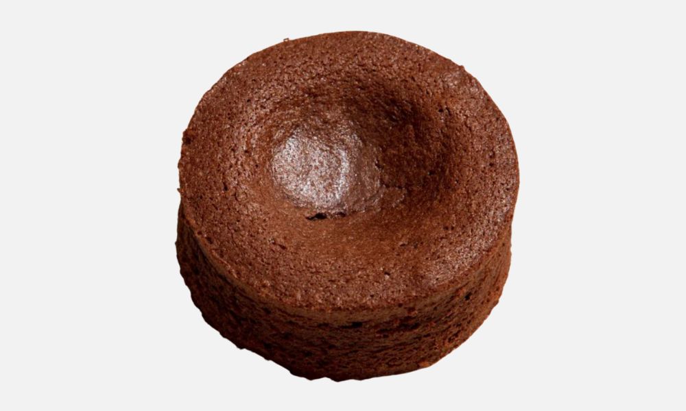 This is an image of a perfectly-round chocolate fondant.