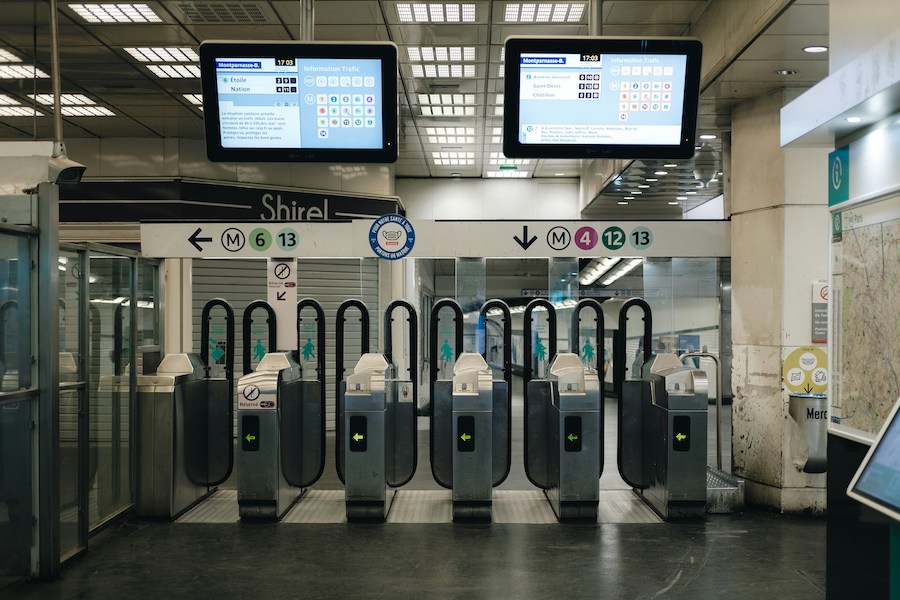 This is a picture of the ticket validation gates in the Paris metro.