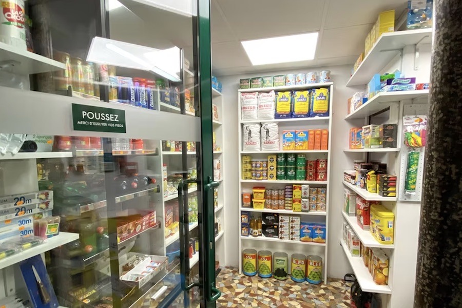 This is an image of a speakeasy front that is a grocery store with fake goods.