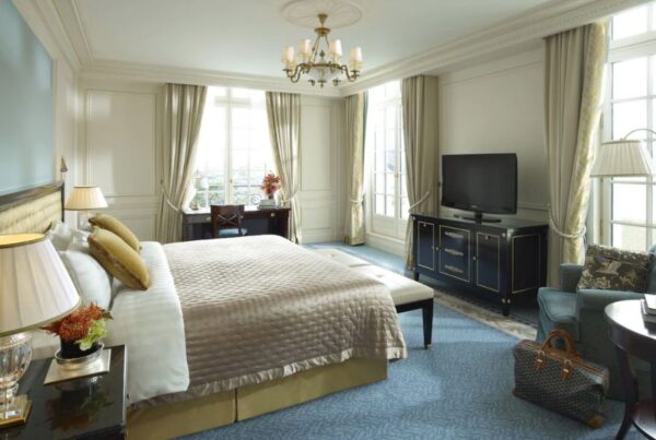 This is an image of a fancy hotel room in Paris.